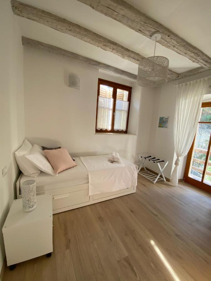 Appartamento Borgo San Tomaso, Tra Storia E Natura โรเวเรโต ภายนอก รูปภาพ